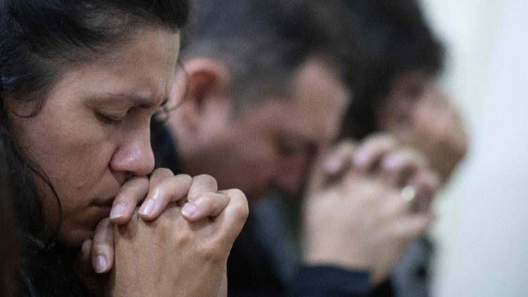 Nicaraguans pray at Mass
